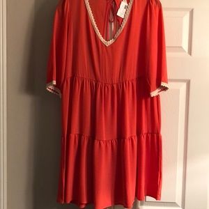 NWT. Coral V-neck women’s size large dress